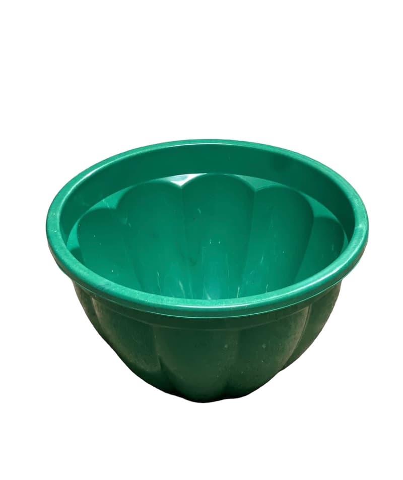 Green round recycled plastic plant pot with fluted sides, moulded in 100% recycled HDPE