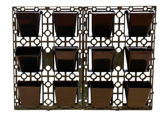 Modular recycled plastic vertical wall planter frame holding twelve square pots — an example of custom moulded product